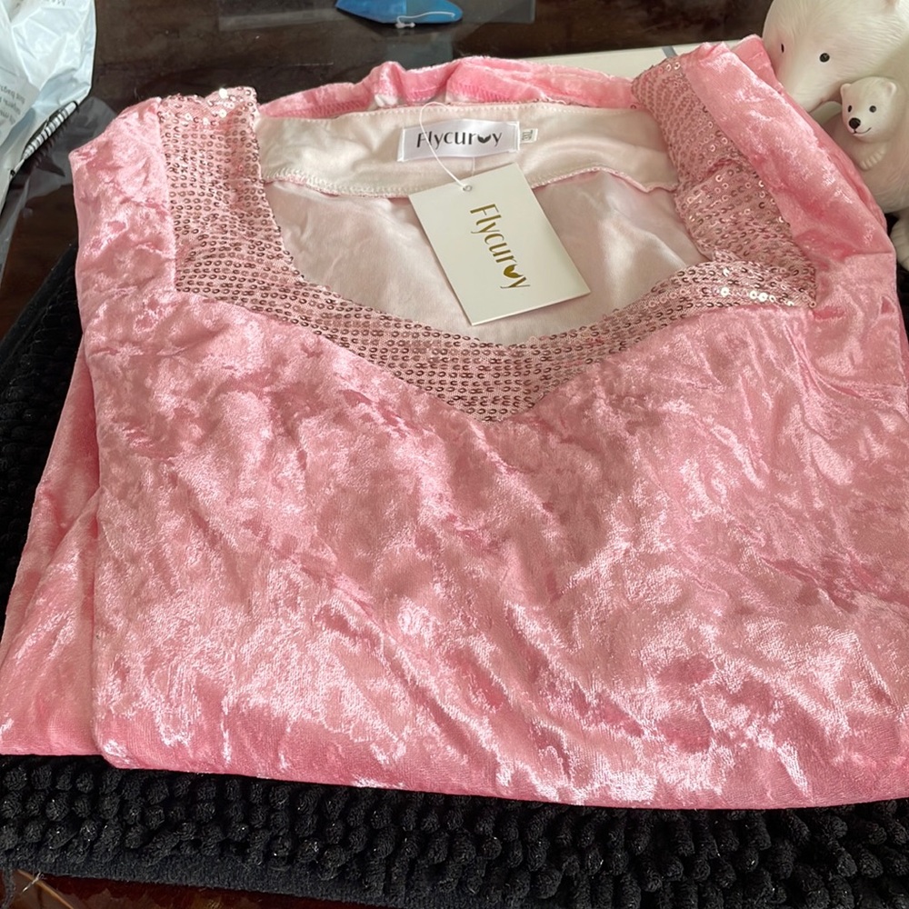 beautiful pink blouse with sequined collar that wraps around the blouse